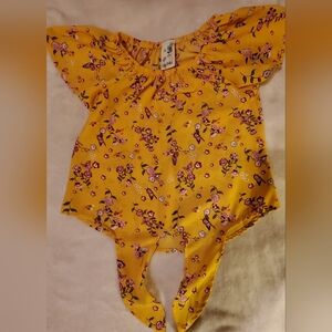 Girls Size 8 butterfly sleeves and tie front.